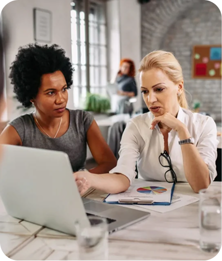 Medical professionals reviewing billing information together