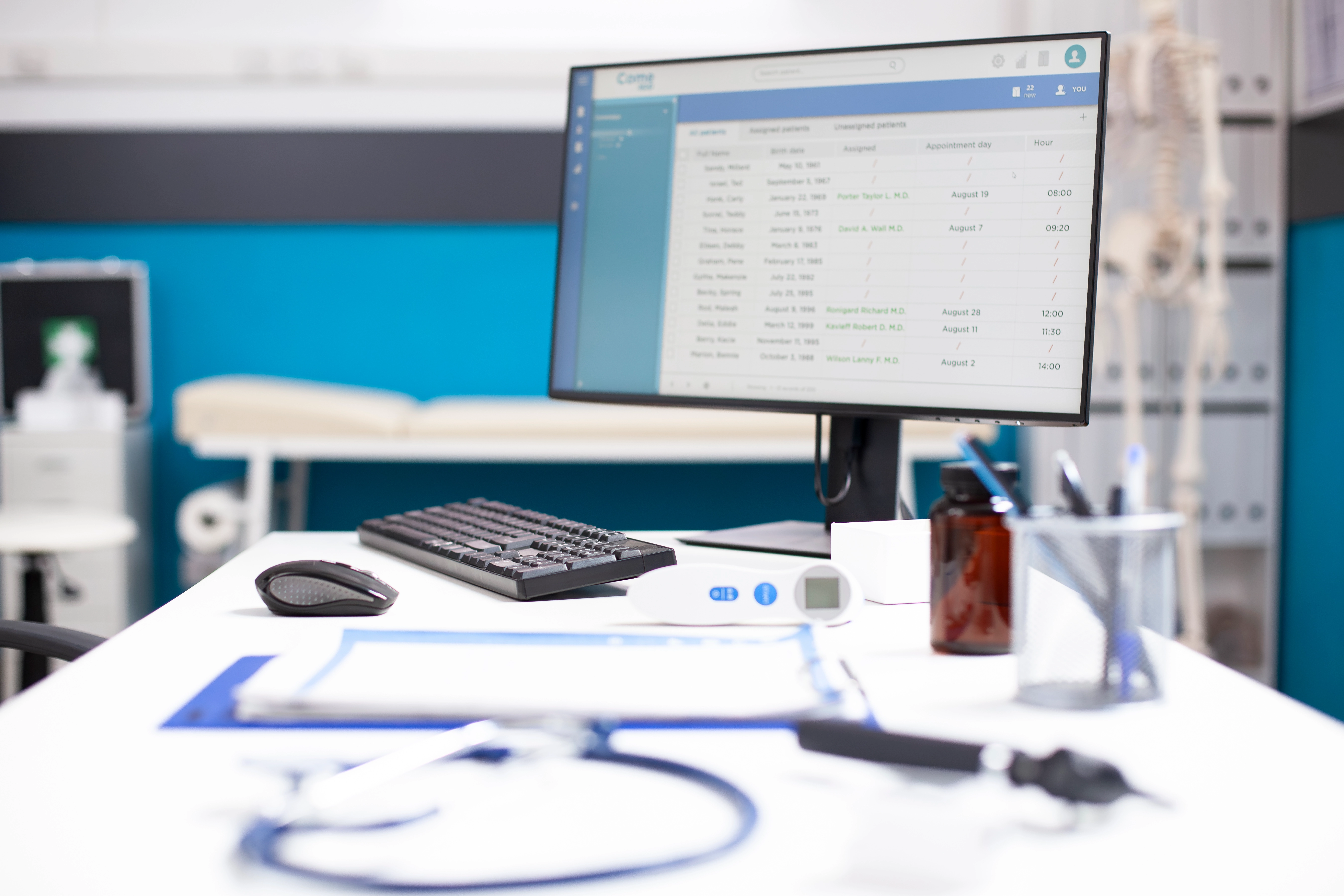 Denial management specialist reviewing claims data